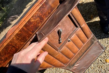 Lifting The Leather Pad To Reveal The Window Winder Which Might Otherwise Catch On Clothing